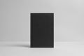 Black Hardcover Book Mock-Up - Front. Wall Background Royalty Free Stock Photo
