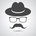 black hat with mustache and glasses isolated on a grey background Royalty Free Stock Photo