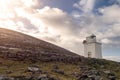 Black Head Lighthouse In Burren, Ireland. Galway Bay In The Background. Blue Cloudy Sky. Famous Landmark On Wild Atlantic Way