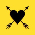 Black Heart with arrow icon isolated on yellow background. Happy Valentine's day. Cupid dart pierced to the heart. Love Royalty Free Stock Photo