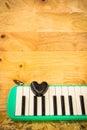 Black heart and melodian Royalty Free Stock Photo