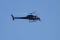 Black Helicopter Filming and Hovering from Side View Royalty Free Stock Photo