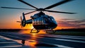 a black helicopter taking off on a runway during the evening Royalty Free Stock Photo