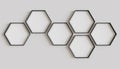 Black hexagon blank photo frames mockup hanging on interior wall. Hexagonal pictures on painted surface. 3D rendering Royalty Free Stock Photo