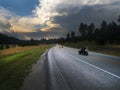 Black Hills motorcyclists ride at sunset