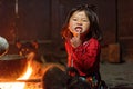 Black Hmong girl making faces