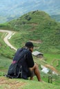 Black Hmong Tribe Man sitting on mountain