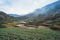 Black Hmong village and terrace rice fields in Winter on foggy and rainy day at Muong Hoa Valley in Sapa, vietnam. harvest from Royalty Free Stock Photo