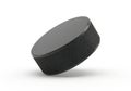 Black hockey puck isolated on white background Royalty Free Stock Photo