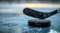 Black hockey puck and stick on ice rink during game. Poster for an upcoming ice hockey championship event. Royalty Free Stock Photo