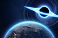 A black hole with an accretion disk against the background of the earth, a disaster. Space, science, galactic nucleus, death of a