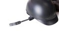 Black horse back riding gear: helmet and whip isolated on the white background Royalty Free Stock Photo