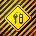 Black Hotel door lock key with number tag icon isolated on yellow background. Warning sign. Vector Royalty Free Stock Photo