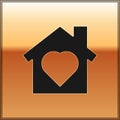 Black House with heart inside icon isolated on gold background. Love home symbol. Family, real estate and realty. Vector