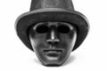 Black human mask in hat Royalty Free Stock Photo