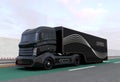 Black hybrid truck on highway