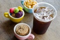Black ice coffee and dessert in cup Royalty Free Stock Photo