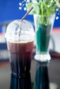 Black ice coffee on glass table Royalty Free Stock Photo