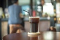 Black ice coffee on wood desk Royalty Free Stock Photo