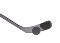 Black ice hockey stick and puck. Royalty Free Stock Photo