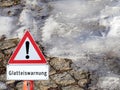 Black ice warning sign in winter in German