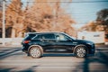 Black Infiniti QX50 side view. AWD crossover SUV in motion Royalty Free Stock Photo