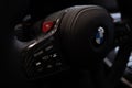 black Interior BMW M2 all-electric car, closeup steering wheel, instrument panel, dashboard, digital gauge cluster, automotive