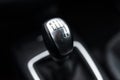 Black interior of a modern car, six-speed manual shift car gear lever. Royalty Free Stock Photo