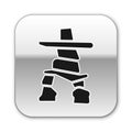 Black Inukshuk icon isolated on white background. Silver square button. Vector