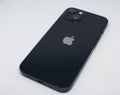 Black iPhone 13 on white background Royalty Free Stock Photo