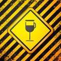 Black Irish coffee icon isolated on yellow background. Warning sign. Vector Illustration