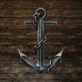 Black iron anchor on hardwood background. 3d render