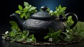 Black iron asian teapot with sprigs of mint for tea. Generative Ai Royalty Free Stock Photo