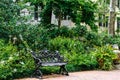 Black Iron Bench in Garden