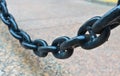 Black iron chain, sun glare Royalty Free Stock Photo