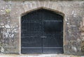 Black iron door in castle. Royalty Free Stock Photo