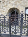 Black iron entrance to old chapel, Prague, Czech Republic