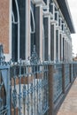 Black iron fence aside church Royalty Free Stock Photo