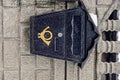 Black iron mailbox on a brick wall Royalty Free Stock Photo