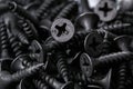 Black iron screws, dowel nails for wood, concrete. Fasteners, hardware Royalty Free Stock Photo