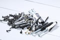 Black iron screws, dowel nails for wood, concrete. Fasteners, hardware Royalty Free Stock Photo