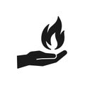 Black isolated icon of flame in hand on white background. Silhouette of fire and hand. Flat design Royalty Free Stock Photo