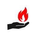 Black isolated icon of flame in hand on white background. Silhouette of red fire and black hand. Flat design Royalty Free Stock Photo