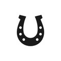 Black isolated icon of horseshoe on white background. Silhouette of horseshoe. Flat design. Symbol of luck