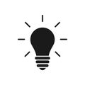 Black isolated icon of light bulb on white background. Silhouette of illuminated lamp. Symbol of idea, creative. Flat design Royalty Free Stock Photo