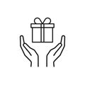 Black isolated outline icon of gift box in open hands on white background. Line icon of gift box and two hands. Give, make a Royalty Free Stock Photo