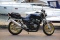 Black Japanese Honda sports motorcycle with gold wheels