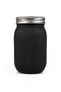 Black jar with milliliter measurement display on white background