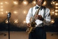 Black jazz performer plays the saxophone on stage