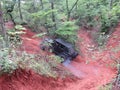 Black jeep attempts to climb a big hill off road Royalty Free Stock Photo